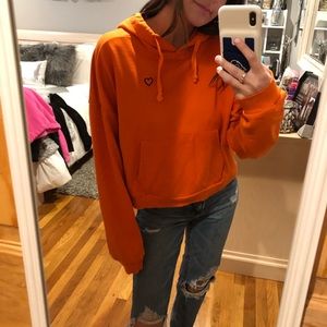 Bright orange cropped hoodie